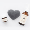 Lifestyle image of One Love Organics The Cleansing Sponge Bamboo Charcoal Heart