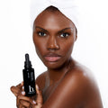 Model image of Beneath Your Mask Nourish Skin and Hair Serum