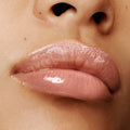 Model image of Tom Ford Rose Exposed Lip Oil Tint (Limited Edition)