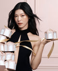 Model image of Laura Mercier Divinely Flawless Translucent Loose Setting Powder & Puff Set (Limited Edition)