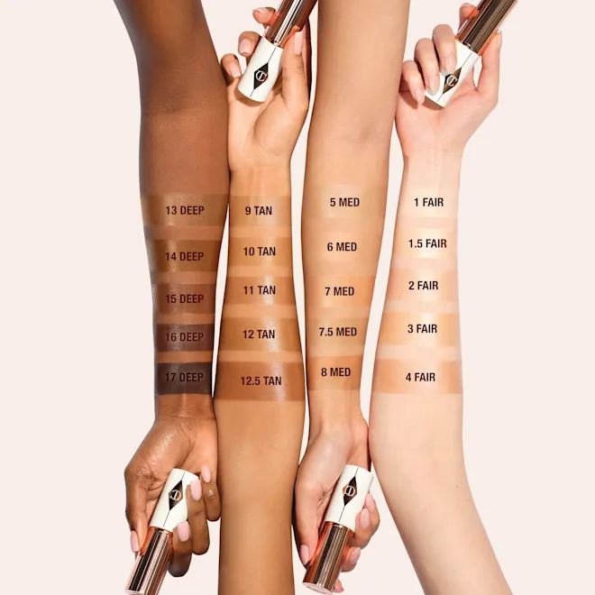 An arm swatch of Charlotte Tilbury Unreal Skin Sheer Glow Tint Hydrating Foundation Stick