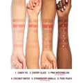 An arm swatch of Charlotte Tilbury Unreal Lips Healthy Glow Nectar Oil variant: Cherry Glaze