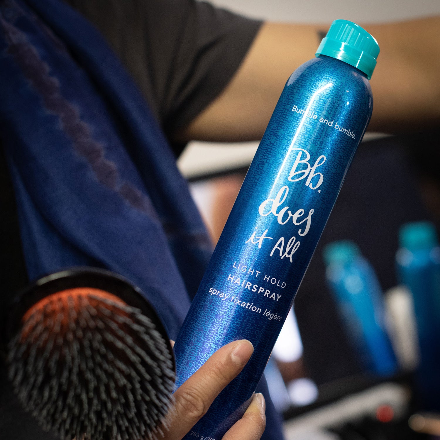 Lifestyle image of Bumble and Bumble Does It All Light Hold Hairspray