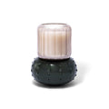 Lifestyle image of Skeem Forest Green Candlescape Candle Teakwood Fir