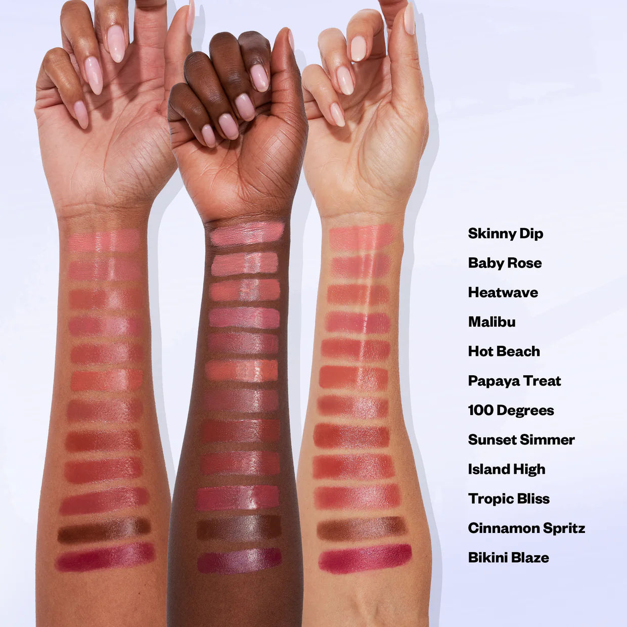 An arm swatch of Kosas Wet Stick Moisturizing Lip Shine