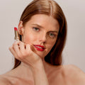 Sisley-Paris Phyto-Rouge Shine Color/Shade variant: 31 Sheer Chili model image 2 . This product is in the color orange