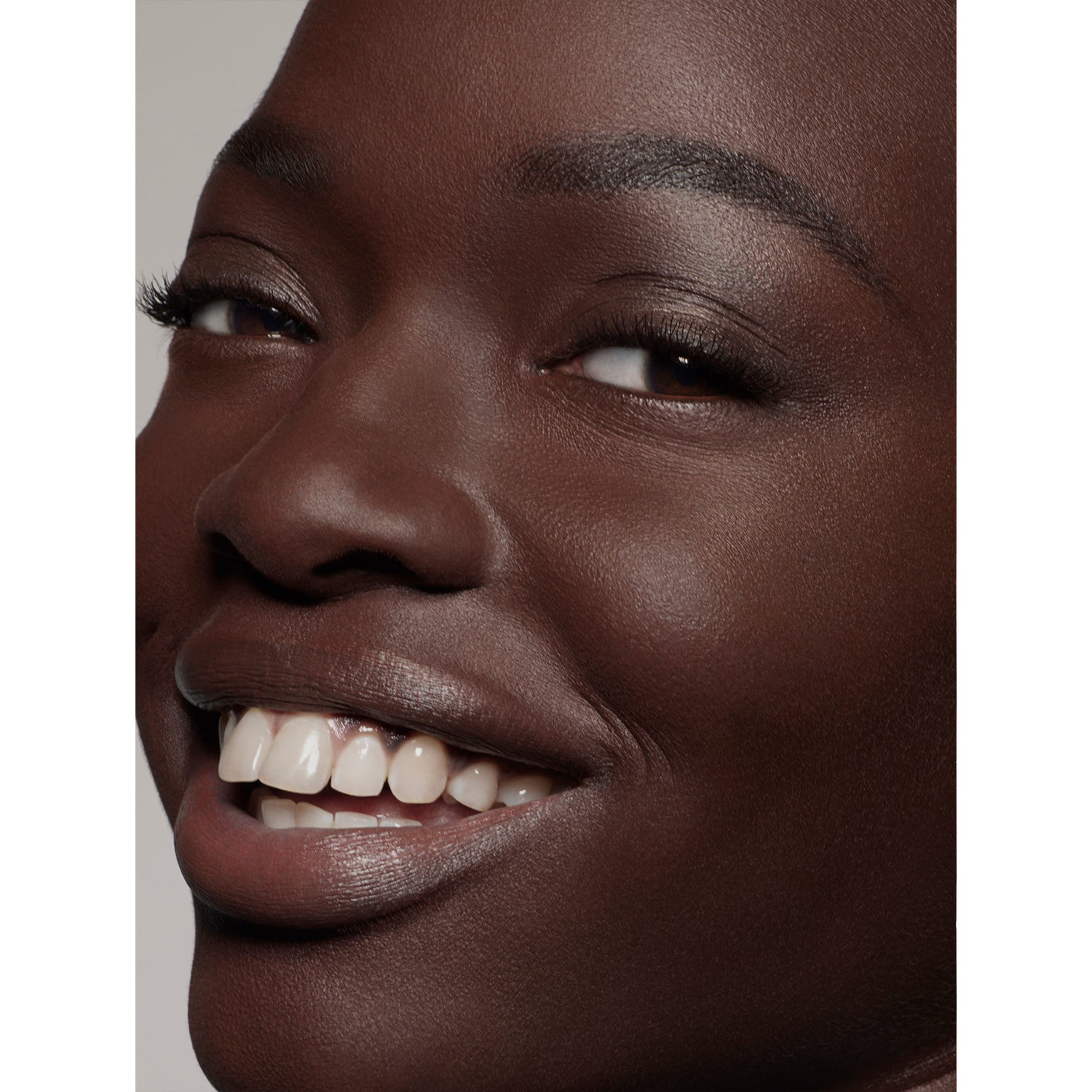 Pat McGrath Labs Sublime Perfection Full Coverage Concealer Color/Shade variant: D35 model image . This product is for deep complexions