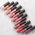 Laura Mercier Lip Glacé Lip Gloss Color/Shade variant: Melon Sorbet lifestyle image . This product is in the color coral