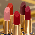 Estée Lauder Pure Color Lipstick Matte Color/Shade variant: Power Kiss lifestyle image . This product is in the color pink