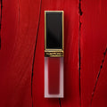 Tom Ford Liquid Lip Luxe Matte Color/Shade variant: Scarlet Screet lifestyle image . This product is in the color red