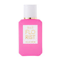 A bright pink, sheer Ellis Brooklyn Florist Eau de Parfum bottle with a white cap and gold collar.