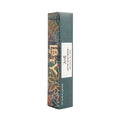 Adelphi Sun Eau De Parfum comes in a rectangular box featuring a dark green, orange, and blue floral pattern reminiscent of a sunlit glasshouse on the sides, with white panels and gold lettering.