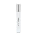A slender glass Lake & Skye 11 11 Lychee Eau de Parfum rollerball with a silver cap and a label listing notes of lychee and ambrette seed.