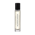 Clear glass Heretic Scandalwood Eau de Parfum roll-on bottle with a black cap, labeled with the scent name and plant-based notes of Bulgarian rose.