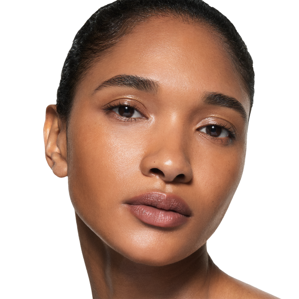 Model image of Victoria Beckham Beauty The Foundation Drops variant: 12 Medium Dark - Medium Dark With Warm Peach Undertones