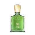 A green glass Wild Vetiver Eau de Parfum bottle by Creed with a gold-tone cap, featuring embossed text and a House of Creed logo on the front.