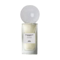 A rectangular bottle of Sana Jardin Sandalwood Temple Eau de Parfum filled with pale liquid and topped with a large, translucent spherical cap.