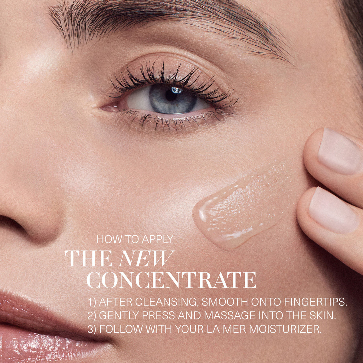 A person uses their fingertip to apply The Concentrate, a clear reparative barrier serum, to their cheek, following text instructions to cleanse, massage into the skin, and finish with a moisturizer.