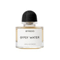 A glass bottle of Byredo Gypsy Water Absolu de Parfum, featuring a black cap and a white label.