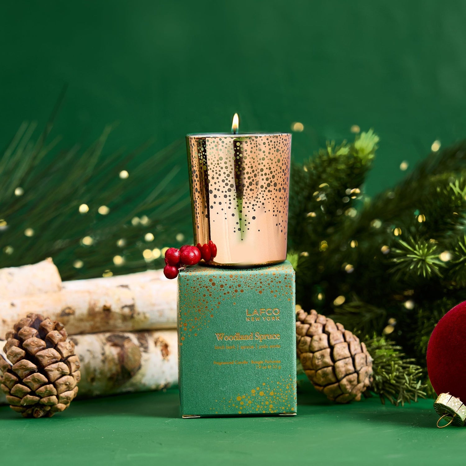 Lifestyle image of Lafco Woodland Spruce Candle (Limited Edition) variant: 1.9 oz (Votive)