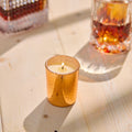 Lifestyle image of Lafco White Maple Bourbon Candle (Limited Edition) variant: 1.9 oz (Votive)