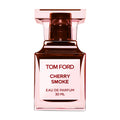 A deep red, square Tom Ford Cherry Smoke Eau de Parfum bottle with a matching geometric cap and a white label featuring black text.