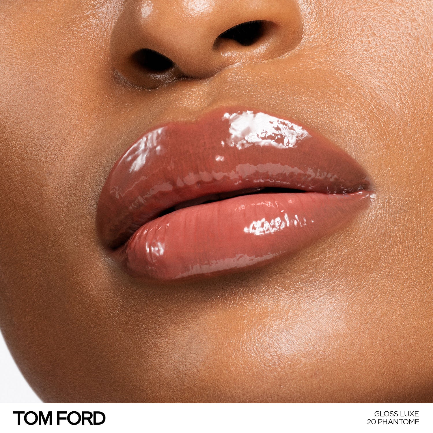 Model image of Tom Ford Gloss Luxe Lip with Hydrating Jojoba Oil variant: 20 Phantome