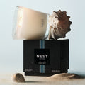 Lifestyle image of Nest Ocean Mist & Sea Salt Candle variant: 21.1 oz (3-Wick)