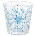 Lifestyle image of Nest Ocean Mist & Sea Salt Decorative Luxury Candle variant: 21.2 oz (3-Wick)
