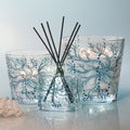 Lifestyle image of Nest Ocean Mist & Sea Salt Decorative Luxury Candle variant: 21.2 oz (3-Wick)