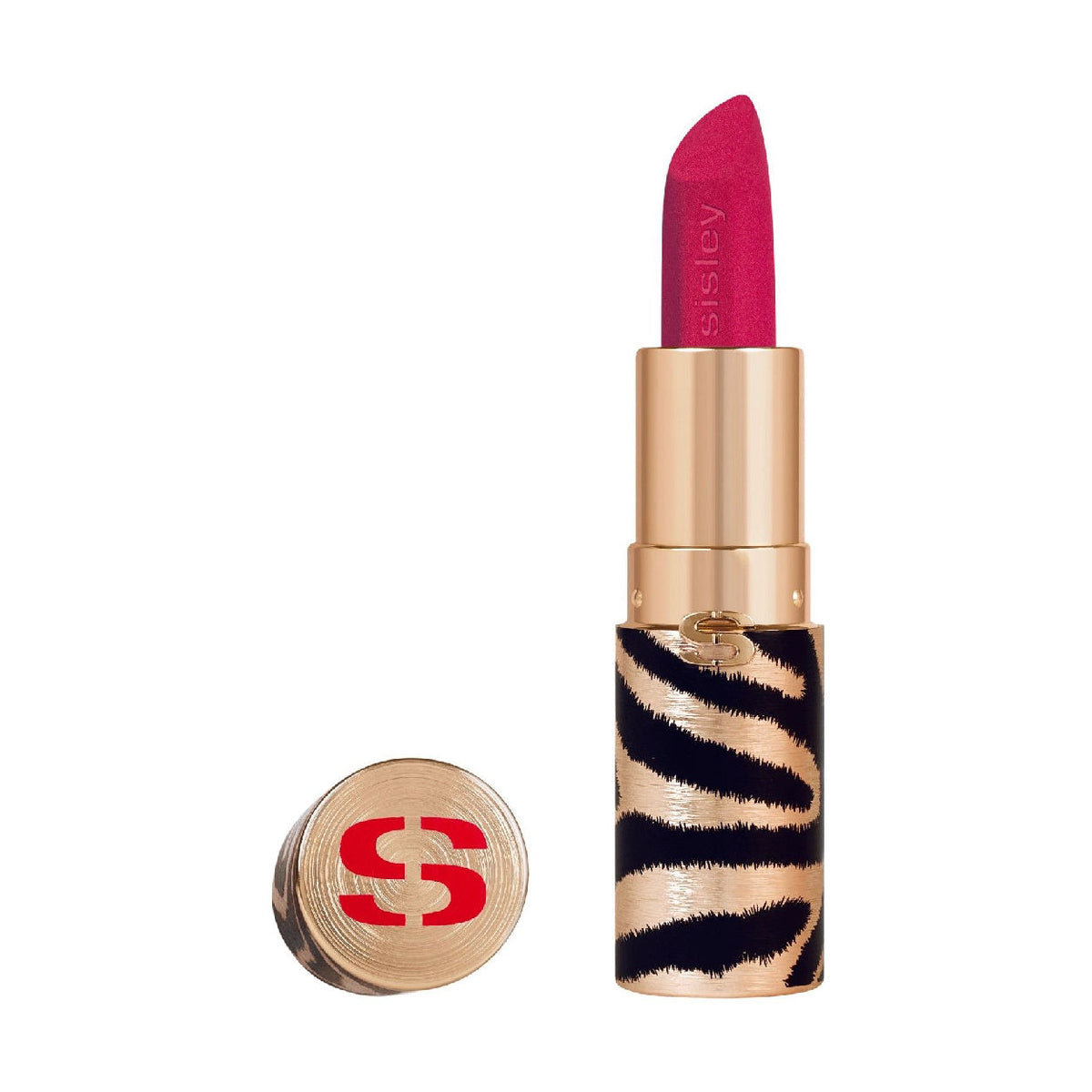 Open tube of bright pink Sisley Paris Phyto-Rouge Velvet lipstick next to its cap, both featuring a black and gold zebra-stripe pattern.