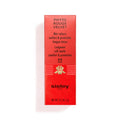 Red rectangular velvet Sisley Paris Phyto-Rouge Velvet lipstick box with product text, a small gold floral emblem, and a net weight of 0.1 oz.