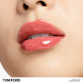 Model image of Tom Ford Gloss Luxe Lip with Hydrating Jojoba Oil variant: 22 SUNRISE PINK