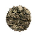 A circular pile of shimmering, olive-green Les Phyto-Ombres Eyeshadow with a unique hybrid texture.