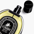 Lifestyle image of Diptyque L'Ombre dans l'Eau Eau de Parfum variant: 2.5 fl oz
