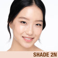 Model image of Charlotte Tilbury  Charlotte's Beautiful Skin Foundation variant: 2 Neutral (medium with neutral undertones)
