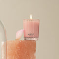Lifestyle image of Nest Himalayan Salt & Rosewater Candle variant: 2 oz (Votive)