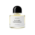 A clear glass Byredo Future Memories Eau de Parfum bottle with a black rounded cap, containing pale yellow liquid that hints at textured vanilla and powdery iris.