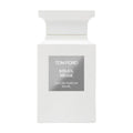 A white rectangular Tom Ford Soleil Neige Eau De Parfum bottle with a silver label, evoking the essence of sun on snow.