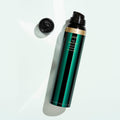 Lifestyle image of Oribe Curl Shaping Mousse variant: 5.7 oz