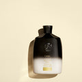 Lifestyle image of Oribe Gold Lust Repair and Restore Shampoo variant: 8.5 fl oz