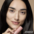 Model image of RMS Beauty Legendary Lip Oil variant: Amber