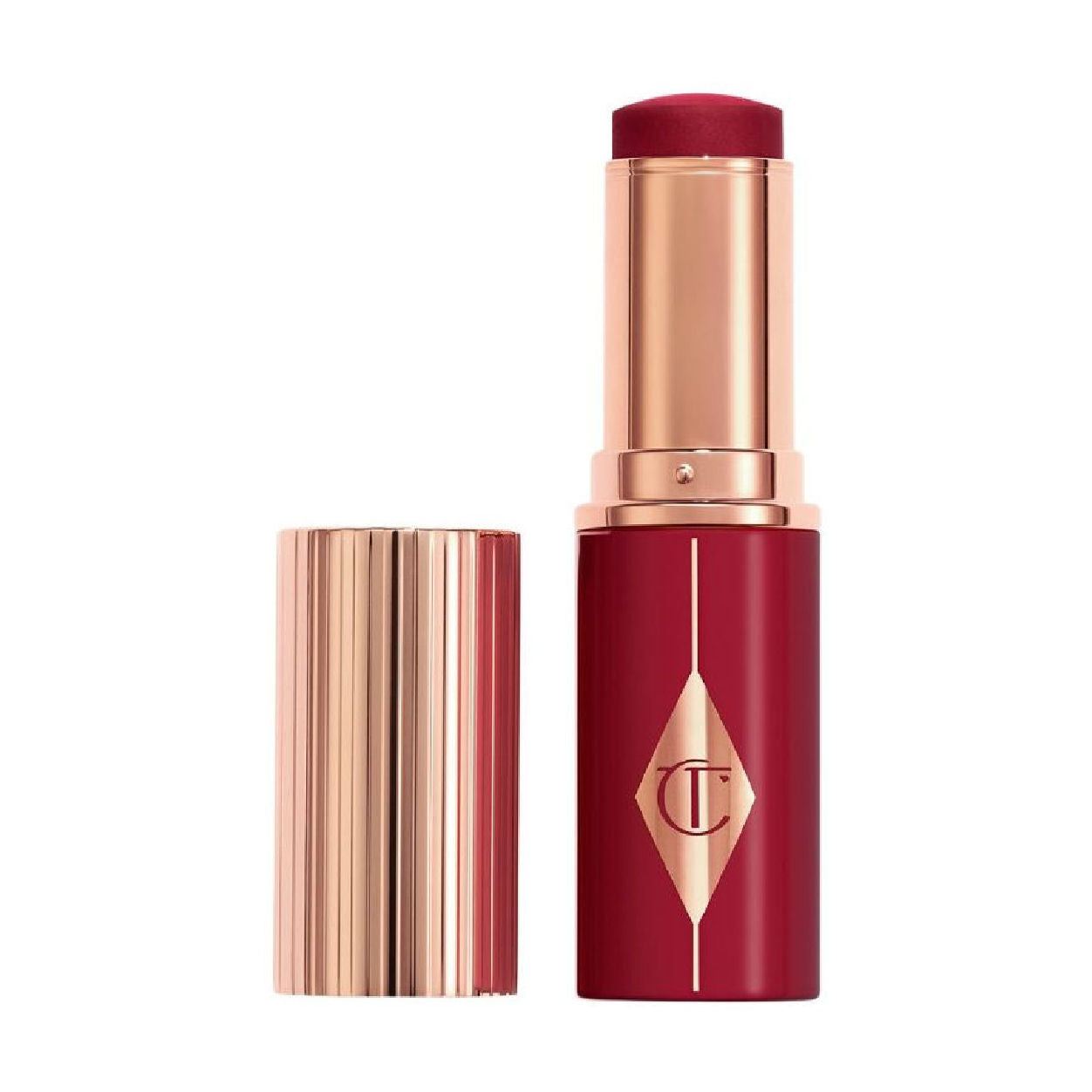 Charlotte Tilbury Unreal Lip + Cheek Glow Blush Stick with Hyaluronic Acid variant: Berry Glow main image
