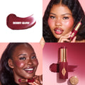 Model image of Charlotte Tilbury Unreal Lip + Cheek Glow Blush Stick with Hyaluronic Acid variant: Berry Glow