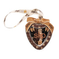 Slip Pure Silk Skinny Scrunchie Trio Ornament (Limited Edition) in a heart-shaped container with three brown and cream silk scrunchies, a velvet bow, and a ribbon for hanging.