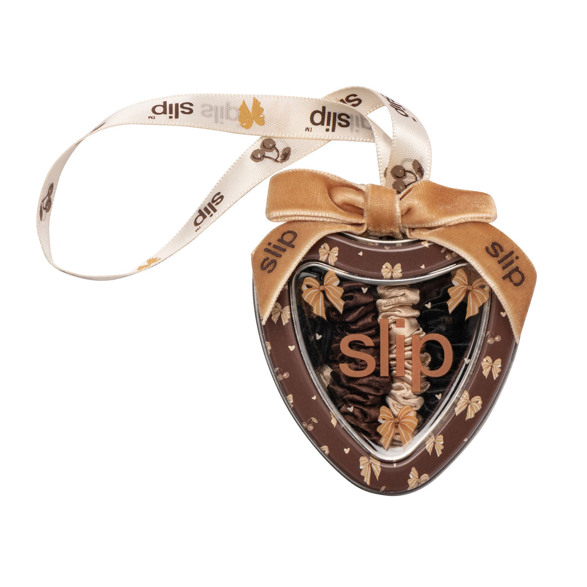 Slip Pure Silk Skinny Scrunchie Trio Ornament (Limited Edition) in a heart-shaped container with three brown and cream silk scrunchies, a velvet bow, and a ribbon for hanging.