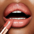 Model image of Charlotte Tilbury K.I.S.S.I.N.G. Lipstick variant: Bitch Perfect