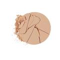 A circular Chantecaille Compact Makeup powder foundation with a cracked and crumbled surface.