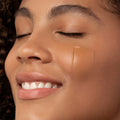 Model image of Chantecaille Just Skin Tinted Moisturizer Sunscreen Broad Spectrum SPF 15 variant: Chestnut