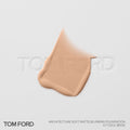 A smear of light beige Tom Ford Architecture Soft Matte Blurring Foundation on a white surface, providing a precision blur that perfects the skin.